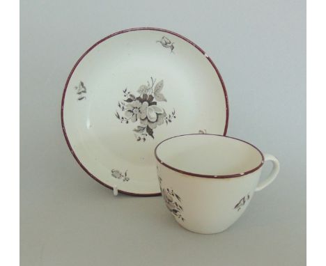 A Spode tea Cup and Saucer decorated with Monochrome flower sprays and brown rimsCirca  1800Size Cup. 8cm diam  6cm high  Sau