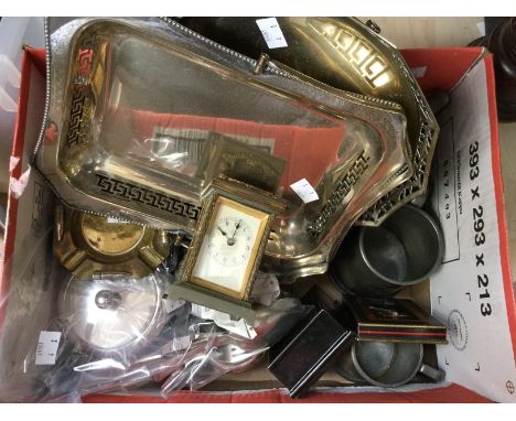 A quantity of metal ware. pewter tankards, musical pewter dish, tea pots, small carriage clock with box, assorted spoons (1 b