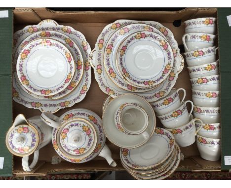 An Aynsley floral patterned tea set, comprising twelve cups, 12 saucers, eleven side plates, two cake plates, milk jug, sugar