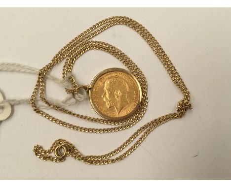 A George V half Sovereign 1914; together with 9ct chain and demountable pendant frame, total combined gross weight approx 9.3