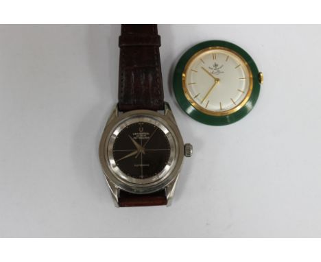 Two watches comprising a circa 1960s vintage Universal Polerouter steel watch and a twenty Dollar watch 'Saint Blaise; small 