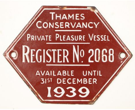 A hexagonal enamel plaque in brown with white lettering "Thames Conservancy Private Pleasure Vessel Register No. 2068. Availa
