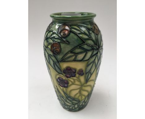 Moorcroft, limited edition, red and yellow flowers on green ground, first quality