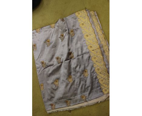 Five and a quarter meters long - 1.18 metres wide approx, an Edwardian textile garment that was a sari and given by a soldier