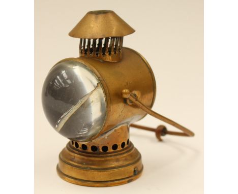 A 1908 paraffin reflector bicycle lamp, brass cased