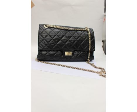 CHANEL a Limited Edition 50th anniversary 2.55 Reissue Quilted classic flap bag, black leather with flap detail and silver to