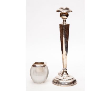 A sterling silver candlestick, together with a silver topped match striker (2)