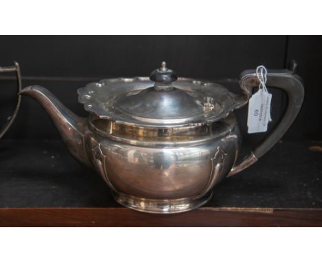 A Mappin and Webb silver teapot, Sheffield 1928, weighing approx 22.51 ozt, ebony handle 