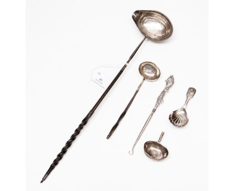  A Georgian silver punch ladle, with a Wrythen handle; together with a further ladle, a caddy spoon, plus other items 