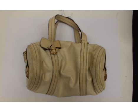 At Auction: GUCCI MONOGRAMMED TALL HOBO SHOULDER BAG