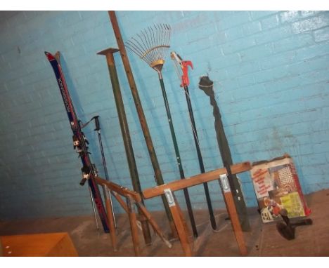 A SELECTION OF TOOLS TO INCLUDE TRESTLES, BRANCH LOPPER, SKIS AND AN ACRO SUPPORT PROP