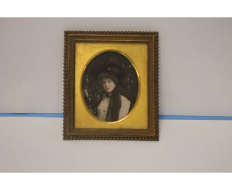 A MINIATURE PORTRAIT IN GILT FRAME