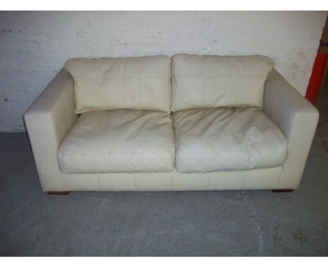 A LEATHER TWO SEATER SOFA