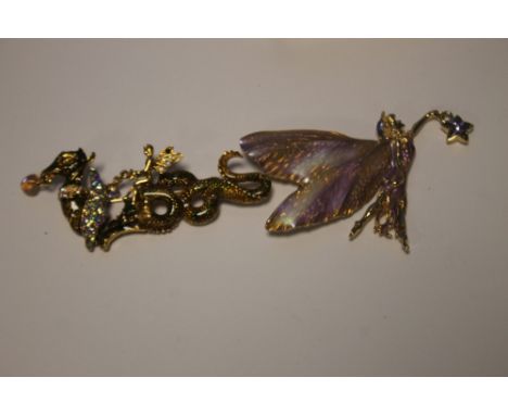 KIRKS FOLLY, TWO ENAMEL BROOCHES, A FAIRY WITH STAR AND A FAIRY RIDING A DRAGON