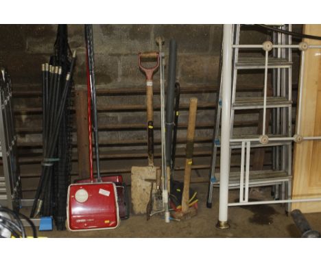 A quantity of miscellaneous items to include wooden handled shovel, sledge hammer, digging trowel, roll of plastic mesh etc.