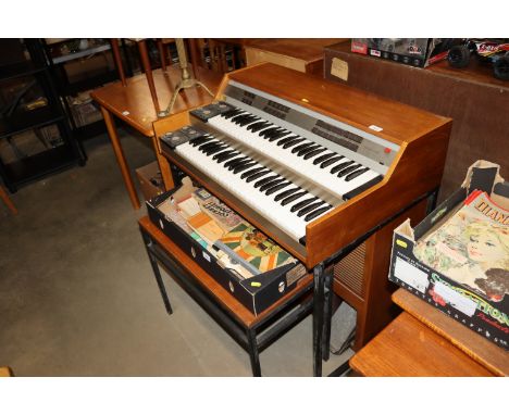 A retro Philips Philicorda electric organ sold as a collectors item complete with stool