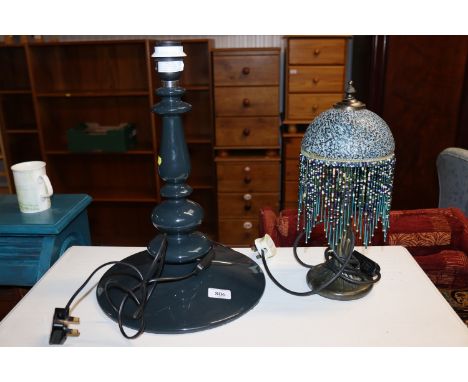 A Tiffany style table lamp with beaded shade and a spindle shape table lamp 
