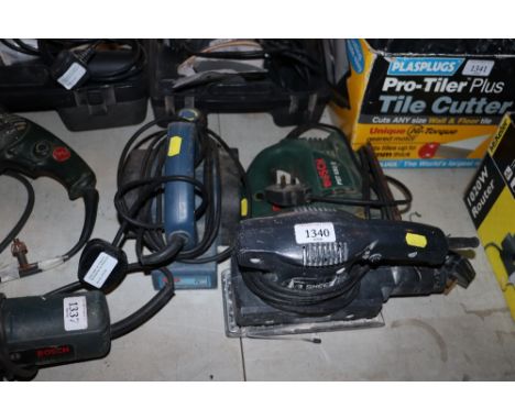 A Bosch PST650E 230v jigsaw, an electric sander and a Challenge MP3780 electric planer 