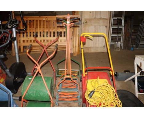 Three vintage push mowers 