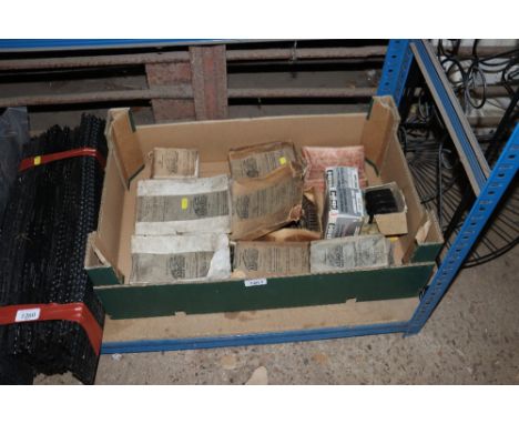A box containing a quantity of vintage car parts to include valve springs, Ferodo brake disc pads etc.