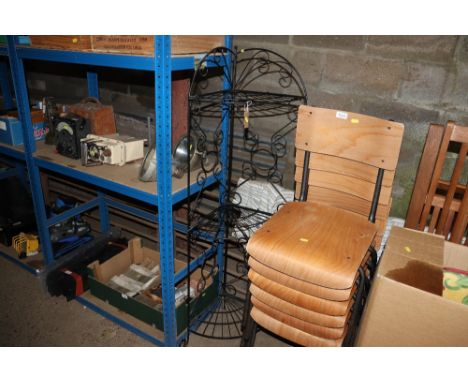 A metal corner three tier shelf unit