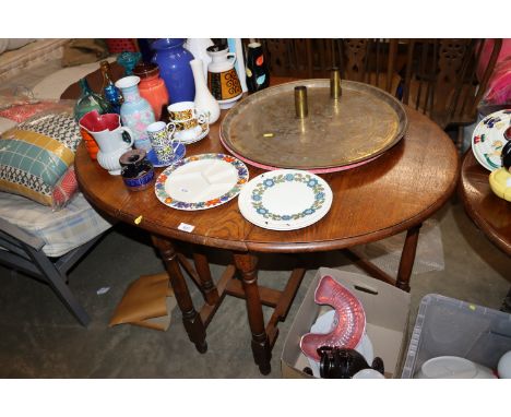 An oak gate leg dining table 