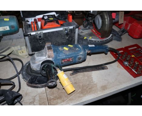 A Ryobi G-2325N 110v angle grinder