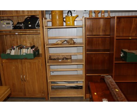 A modern beech folding shelf unit