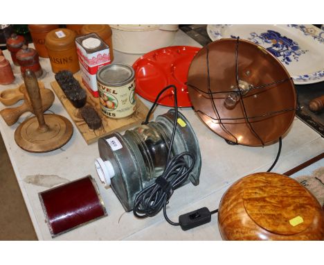 A copper ships lamp converted and a copper heat lamp sold as a collectors item