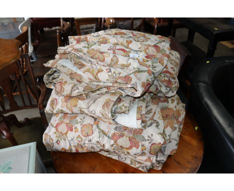 Three pairs of floral patterned curtains