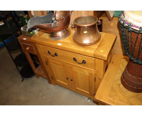 A good quality light elm finish side cabinet with single drawer and cupboard below