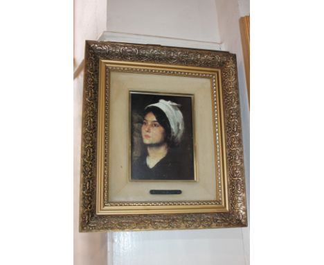 A coloured print depicting a Spanish girl with white headscarf, with plaque Ntro. P. Jesus del Gran Poder, 18.5cm by 13.5cm, 