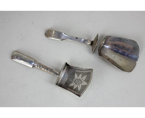 A George III silver tea caddy spoon, shovel shape, the bowl with floral engraved decoration, maker William Pugh, Birmingham 1