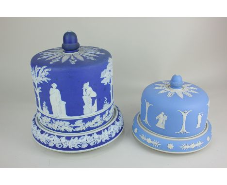 A Jasperware Stilton cover and stand, dark blue and white, with acorn finial, decorated with classical figures amongst flora 