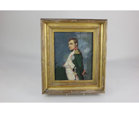 An early 20th century embroidered portrait print of Napoleon Bonaparte, with inset buttons and sword hilt, label verso 'Napol