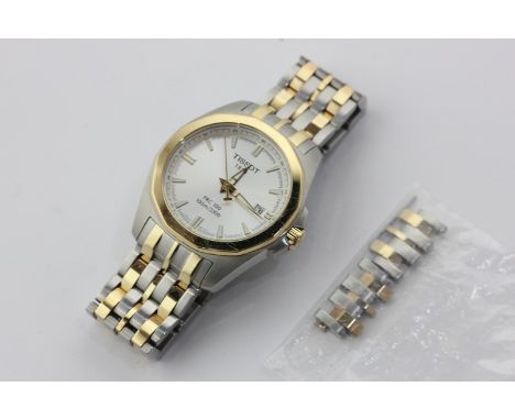 A gentleman's steel and rolled gold Tissot bracelet watch with spare links