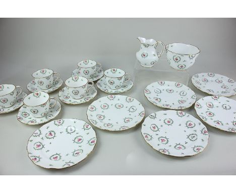 A Royal Crown Derby porcelain part tea service, Rd No 345784, with foliate and pink floral decoration on white ground, with g