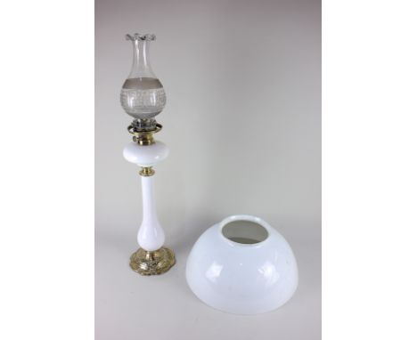 A white glass table oil lamp, with clear frilled glass shade, 67.5cm, with associated large glass shade, 35cm diameter