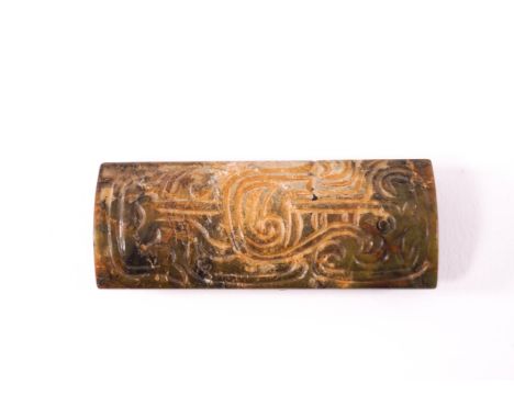 A Chinese Ming Dynasty jade toggle, carved with a bird to each side, 6.5cm x 2.5cm