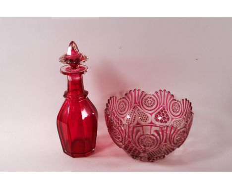 A Victorian ruby flash cut glass bowl, 22cm diameter, together with a flash glass decanter and stopper, 30cm high