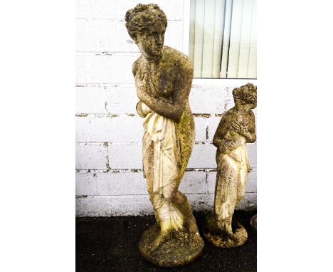 A large garden re-constituted stone sculpture of a classical lady, 157cm high