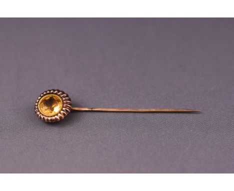 A late Victorian rose gold and citrine stick pin, 6.5cm, 2.7grams 