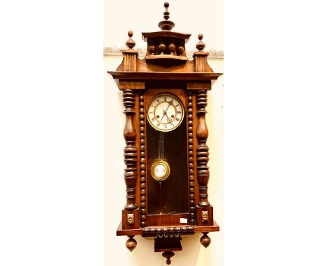 A Victorian mahogany Vienna wall clock, in the style of Gustav Becker, 5.5inch diameter enamel dial with roman numerals, twin