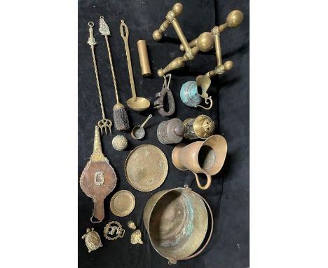 Quantity of Brass and brass coloured ware&nbsp; pair of Fire dogs, Jam Pan, Bellows, Jugs , Toasting fork, Bells etc.
