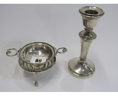 SILVER TEA STRAINER ON STAND, possibly Birmingham 1913; also circular based dressing table candlestick (damaged) 