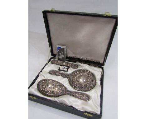 CASED SILVER 4 PIECE DRESSING TABLE SET, comprising hand mirror, 2 brushes and comb, ornate embossed decoration 