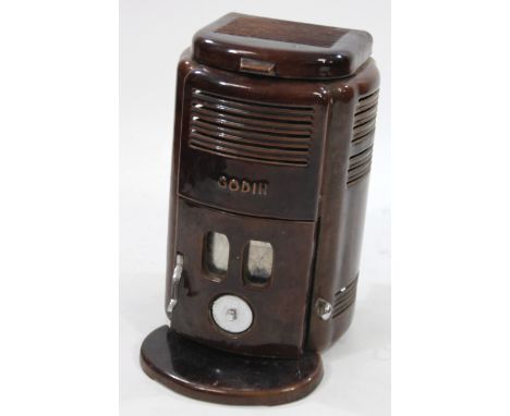 A Godin stove, with brown stove enamel finish. (AF)