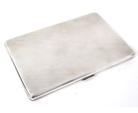 A George VI silver cigarette case, the rectangular body engine turned with an inscription dated 25th November 1939, Birmingha