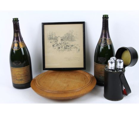A 20thC light oak lazy Susan, of cylindrical outline, 37cm dia., two empty bottles of Verve Cliquot Champagne, a travelling d