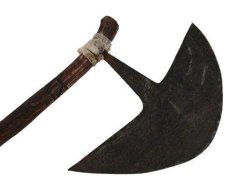 An African tribal Zulu type axe, with shaped blade and turned stem with etched sections, 37cm high.